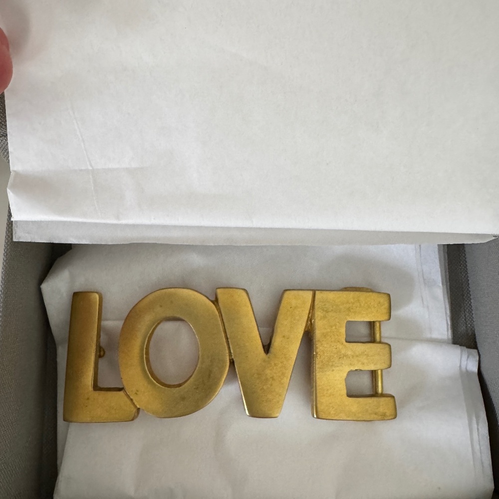 "Love" belt buckle